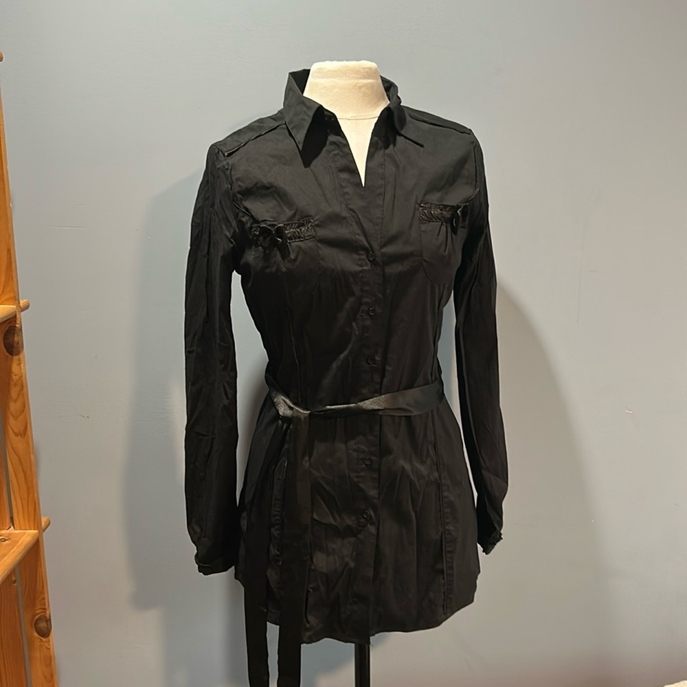 Black tunic buttoned top with satin belt, bow on pocket and piping
